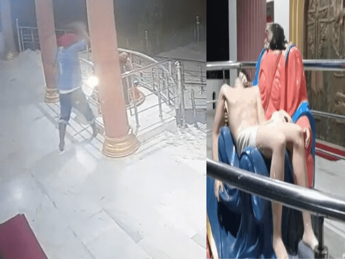 church and a statue of Jesus and Mary vandalised