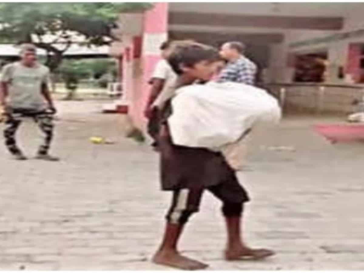 Denied ambulance, 10-yr-old carries brother's body in UP district