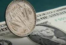 Rupee falls to record low against US dollar