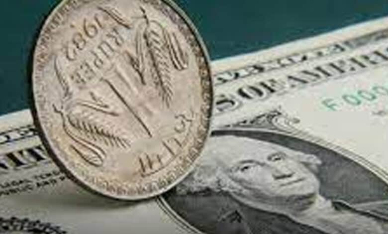 Rupee falls to record low against US dollar