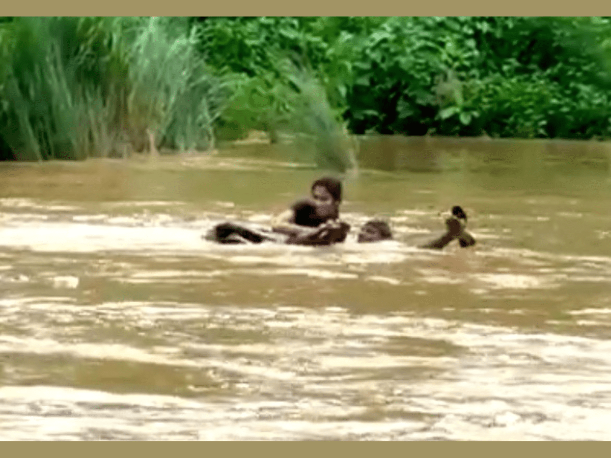 A 21-year-old student in Andhra Pradesh's Vizianagaram district had to cross a river without any conveyance to appear in an examination.