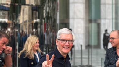 Tim Cook greets first iPhone 14 buyers at iconic NY store