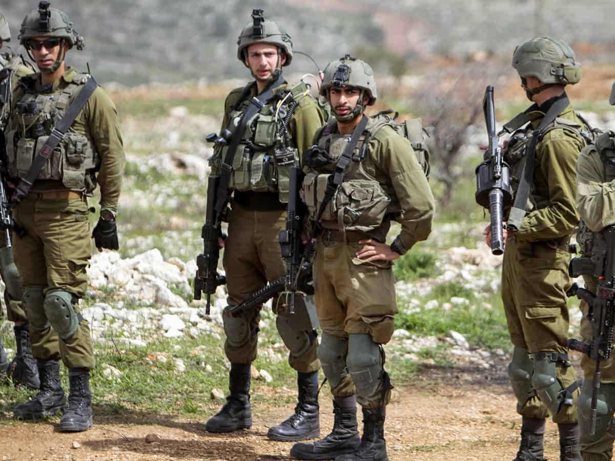 Manhunt for attacker after 3 Israelis injured in West Bank shooting