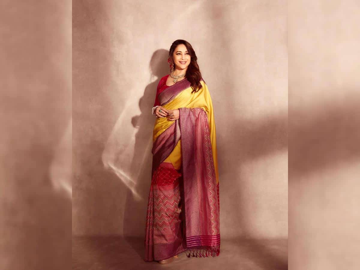 Madhuri Dixit looks gorgeous in yellow saree