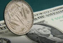 The rupee falls 20 paise to close at 82.85 against US dollar