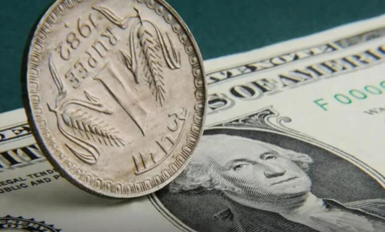 Rupee falls 5 paise to settle at 85.74 against US dollar