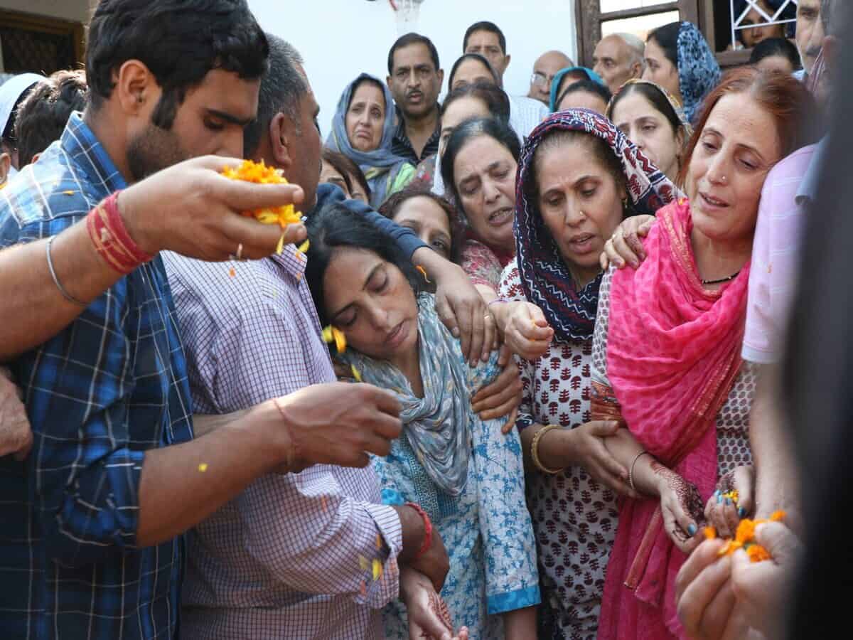 Emotional scenes at cremation of slain Kashmiri pandit in Jammu