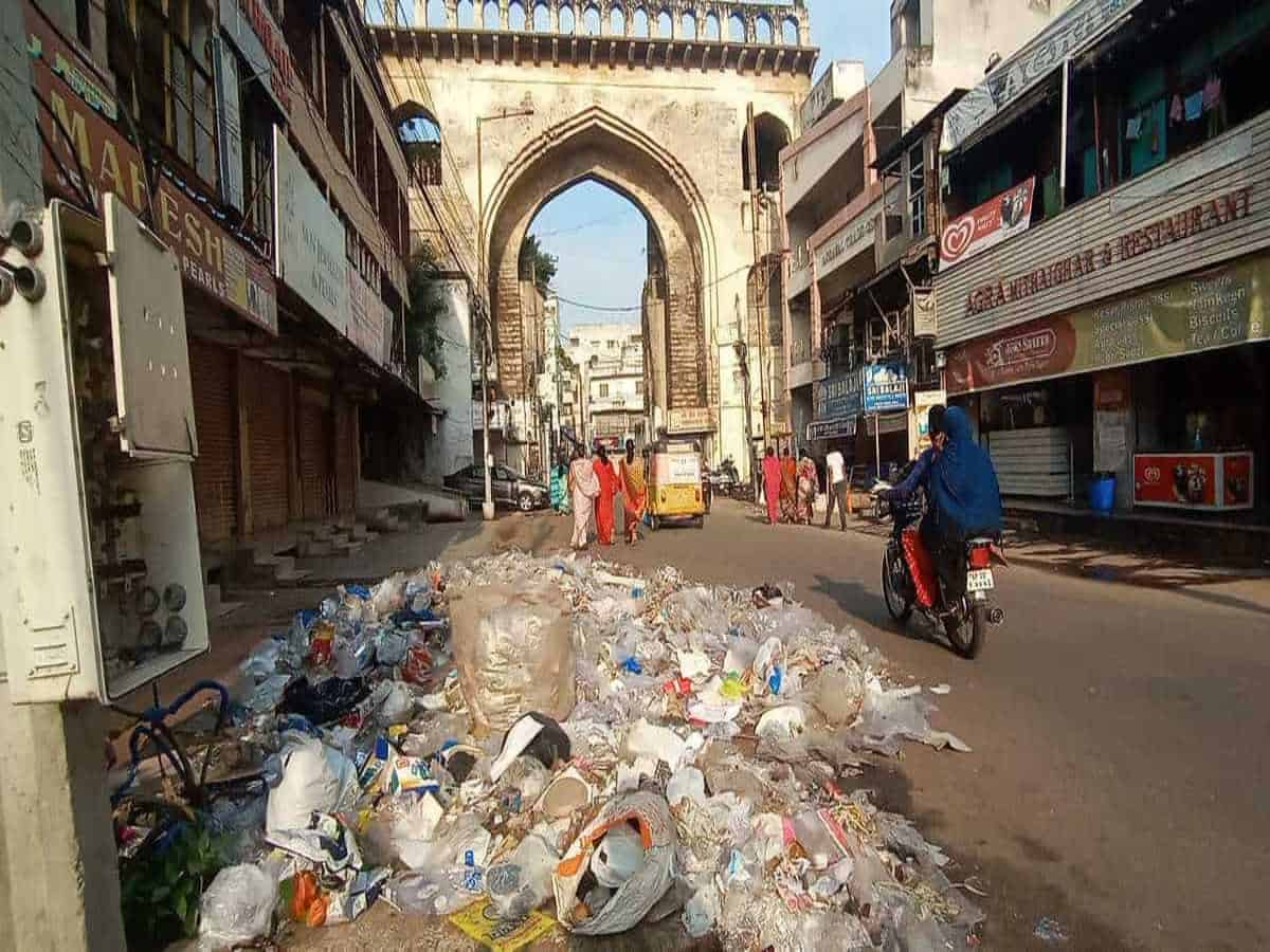 Garbage piles, damaged roads, overflowing sewage in Charminar
