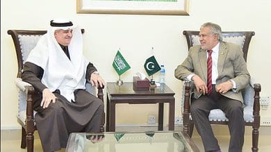 Finance Minister Ishaq Dar with Nawaf bin Said Al-Malki, the Saudi ambassador.