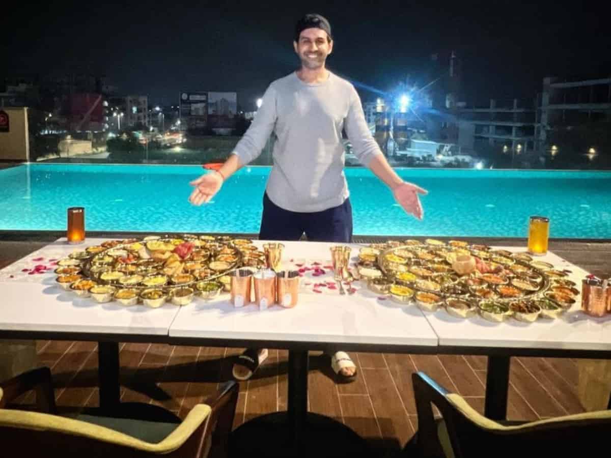 Kartik Aaryan poses with massive Gujarati thalis