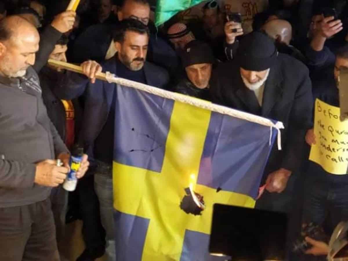 Jordanians burn Swedish flag in front of embassy in Amman