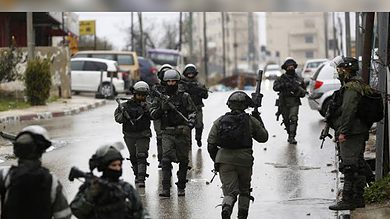 Israeli police raid Palestinian neighbourhood to identify 'assailants'