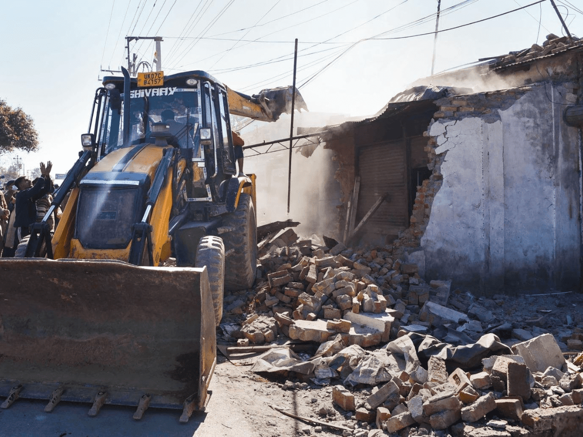 A house being demolished in Kashmir