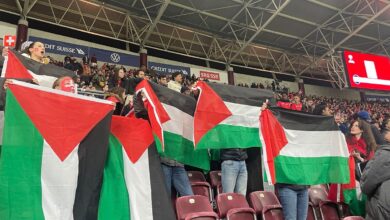 Swiss football fans raise flag of Palestine in match against Israeli team