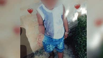 Body of missing 2-year-old found in suitcase in neighbour's house