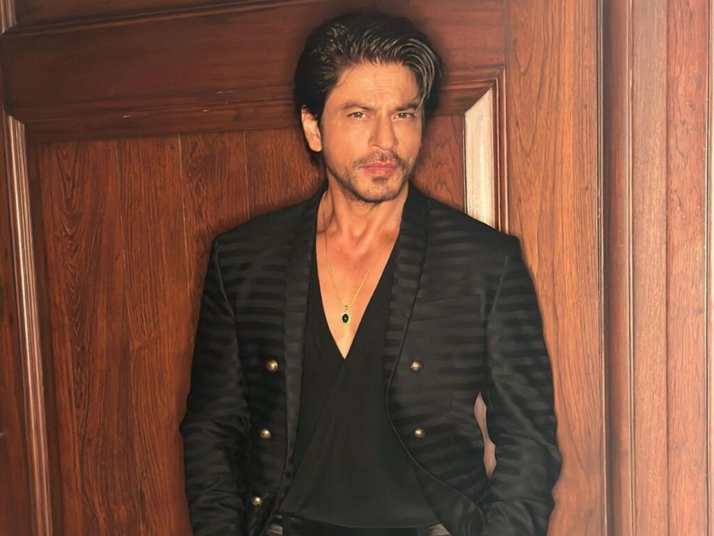 Shah Rukh Khan looks dapper in black suit for Ambani event, fan says "SRK giving competition to his son"