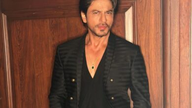 Shah Rukh Khan looks dapper in black suit for Ambani event, fan says "SRK giving competition to his son"