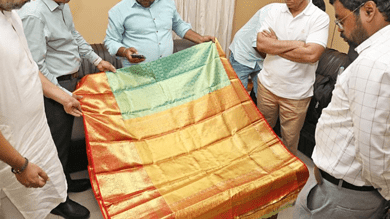 Telangana devotee donates saree with gold zari to Lord Balaji