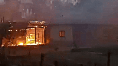A house burns during the ethnic violence that hit Manipur two years ago