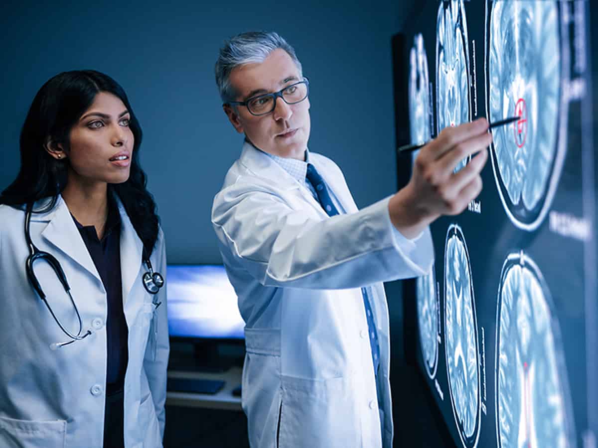 Microsoft's healthcare AI subsidiary Nuance undergoing layoffs: Report