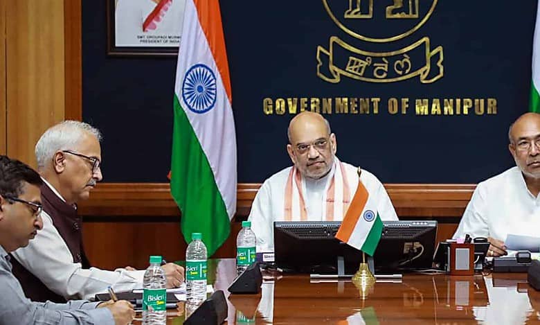 Imphal: Union Home Minister Amit Shah with Manipur Chief Minister N. Biren Singh chairs a meeting with a delegation of leaders from various political parties, in Imphal, Tuesday, May 30, 2023. (PTI Photo)