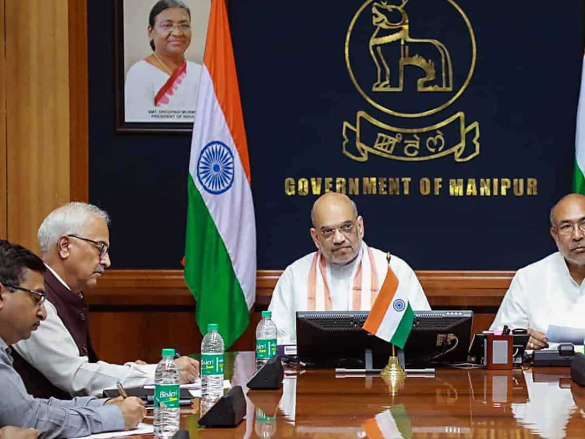 Imphal: Union Home Minister Amit Shah with Manipur Chief Minister N. Biren Singh chairs a meeting with a delegation of leaders from various political parties, in Imphal, Tuesday, May 30, 2023. (PTI Photo)