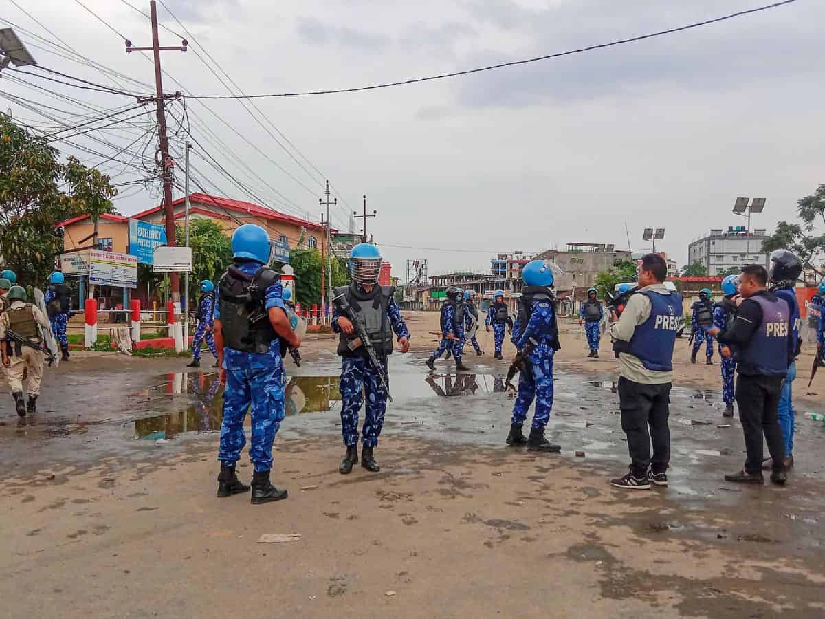 Imphal: Security personnel stand guard at violence-hit Konung Mamang area during the ongoing ethnic clashes, in Imphal East district, Thursday, June 15, 2023.