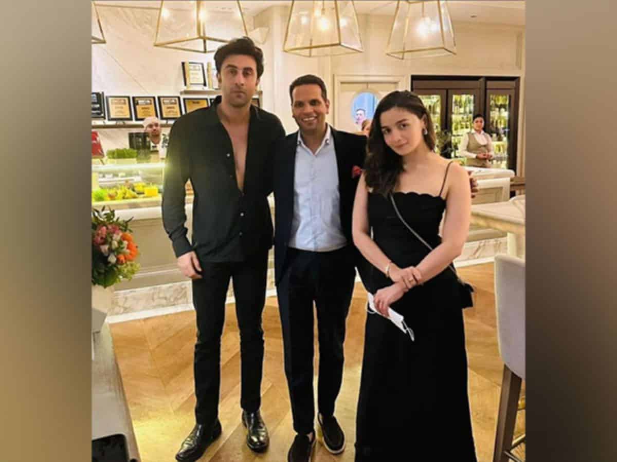 Ranbir Kapoor, Alia Bhatt twin in black outfits as they pose with a fan in Dubai