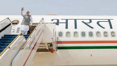 Prime Minister Narendra Modi emplanes for Delhi