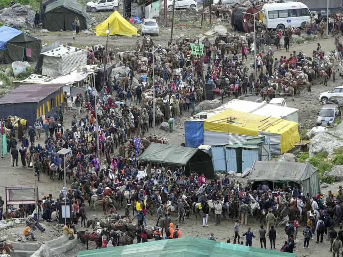 Baltal: Pilgrims on their way to the holy cave shrine of Amarnath at Baltal in Ganderbal district of central Kashmir, Saturday, July 1, 2023. The 62-day-long pilgrimage to the holy cave shrine of Amarnath began on Saturday from the twin tracks- the traditional track of Pahalgam in Anantnag district and the shorter track of Baltal in Ganderbal district. (PTI Photo/S. Irfan)