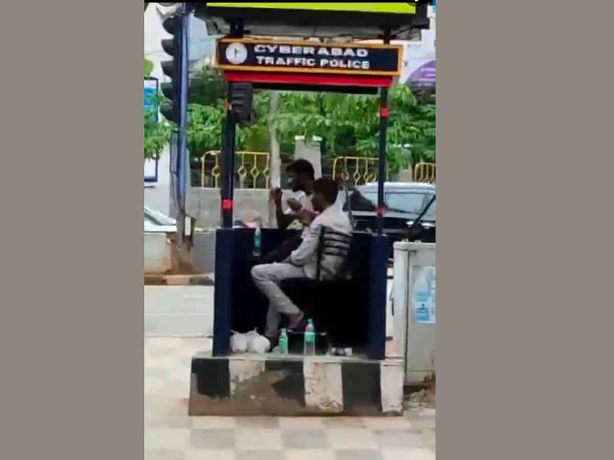 Video of men boozing in traffic booth at Hitech drives attention