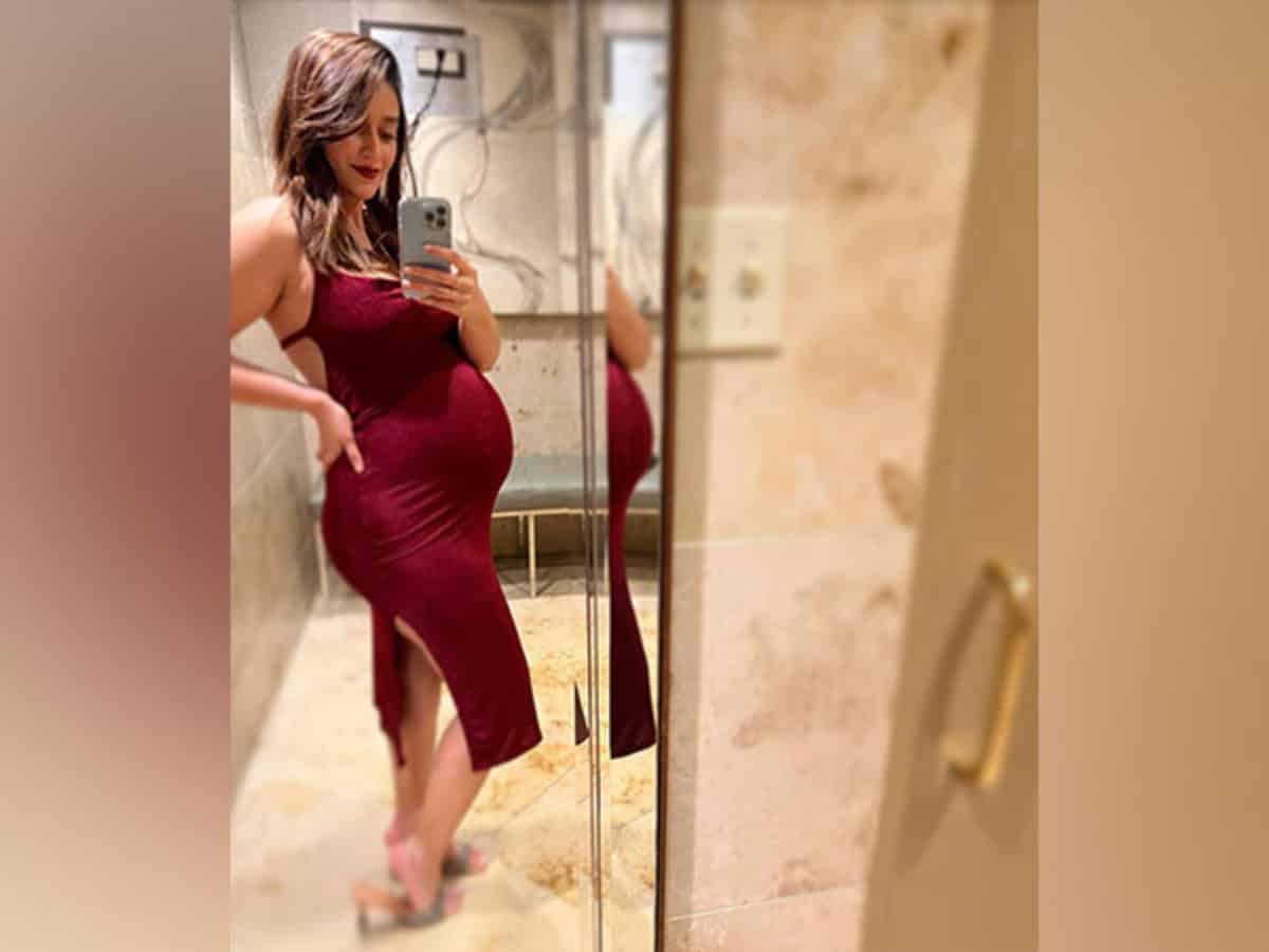 Ileana D'Cruz flaunts baby bump, calls it 'My little'