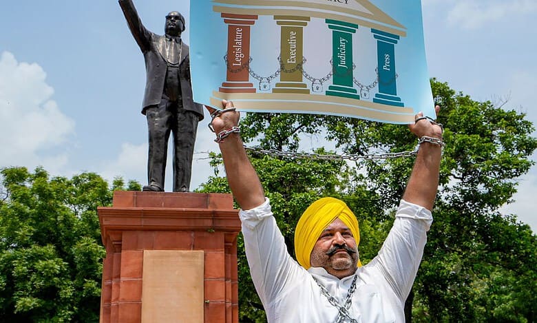 AAP’s Sushil Kumar Rinku comes to Parliament in chains to protest suspension
