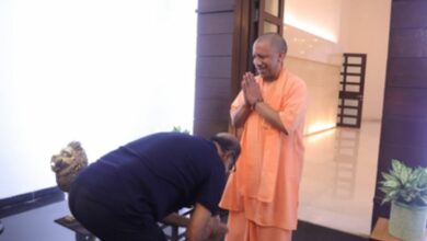 Actor Rajinikanth touches feet of Uttar Pradesh Chief Minister Yogi Adityanath