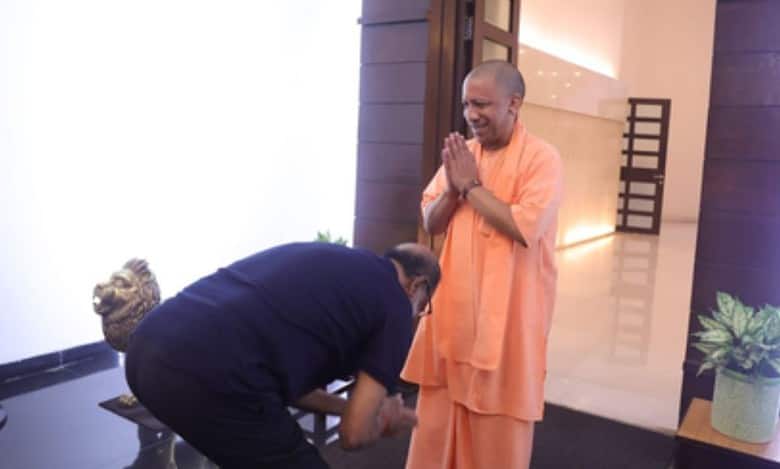 Actor Rajinikanth touches feet of Uttar Pradesh Chief Minister Yogi Adityanath
