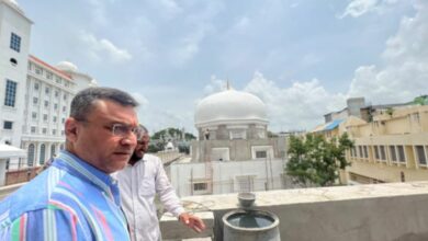 Akbaruddin Owaisi inspects construction of mosque.