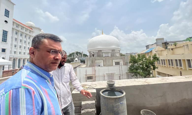 Akbaruddin Owaisi inspects construction of mosque.