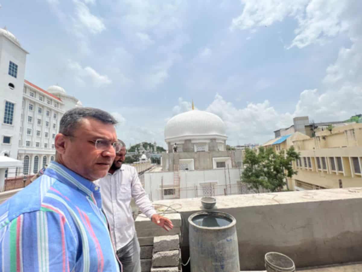 Akbaruddin Owaisi inspects construction of mosque.