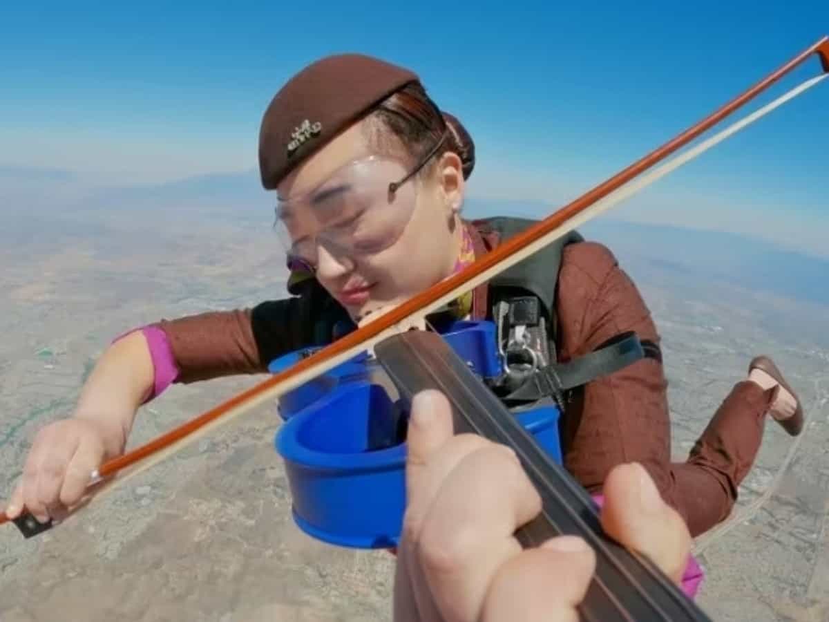Watch: Etihad cabin crew performs mid-air orchestra in skydiving stunt