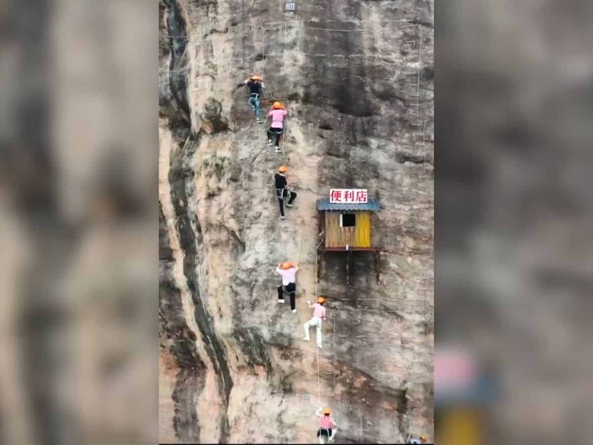 Watch: Convenience store hangs on cliff side at 393 feet in China