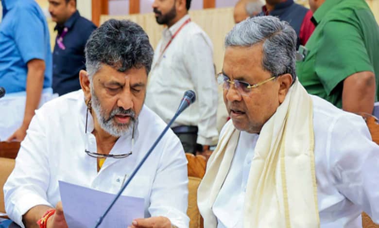 The image displays Karnataka CM Siddaramaiah and deputy CM DK Shivakumar