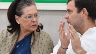 Rahul Gandhi and Sonia Gandhi indulge in a conversation.
