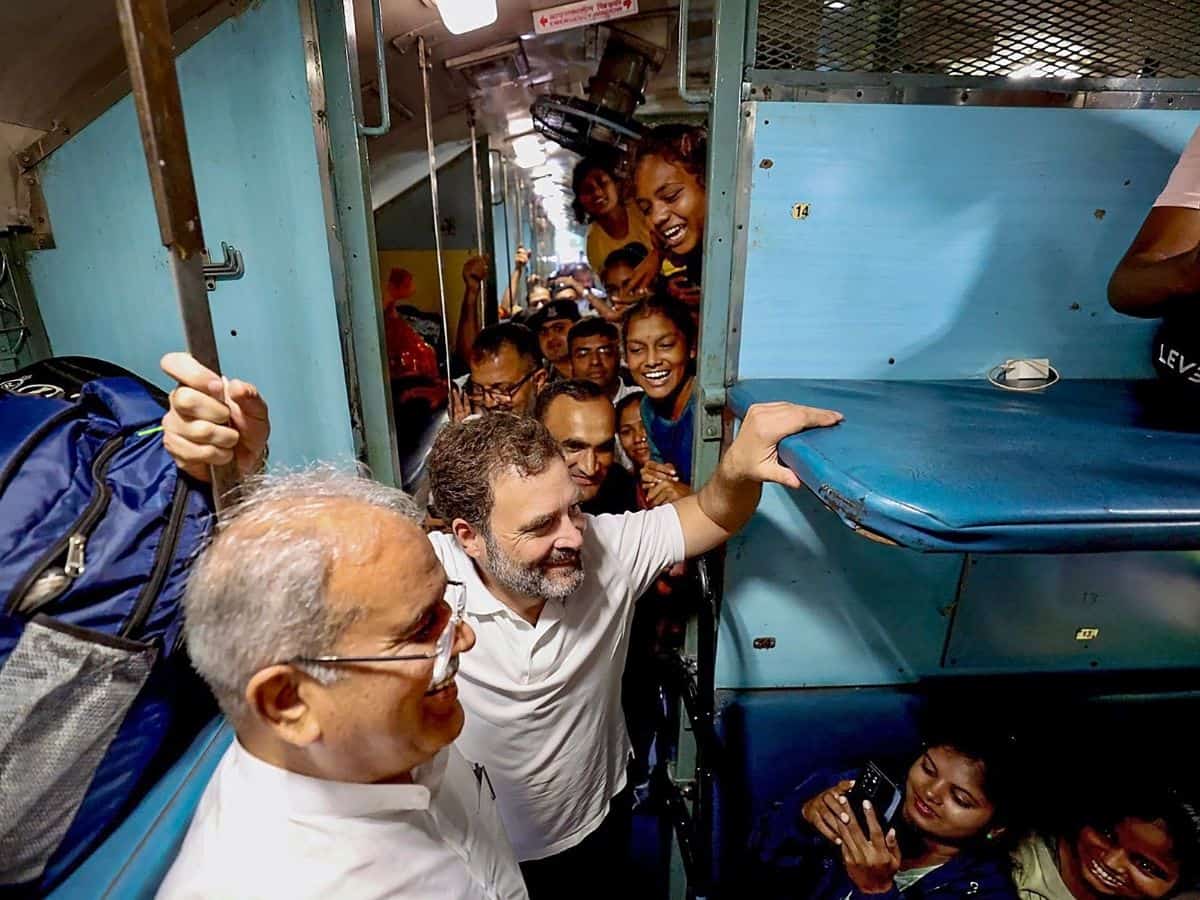 Chhattisgarh Chief Minister Bhupesh Baghel and Congress leader Rahul Gandhi travel by a train