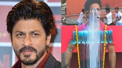 Fans pour milk on SRK's poster, King Khan reacts