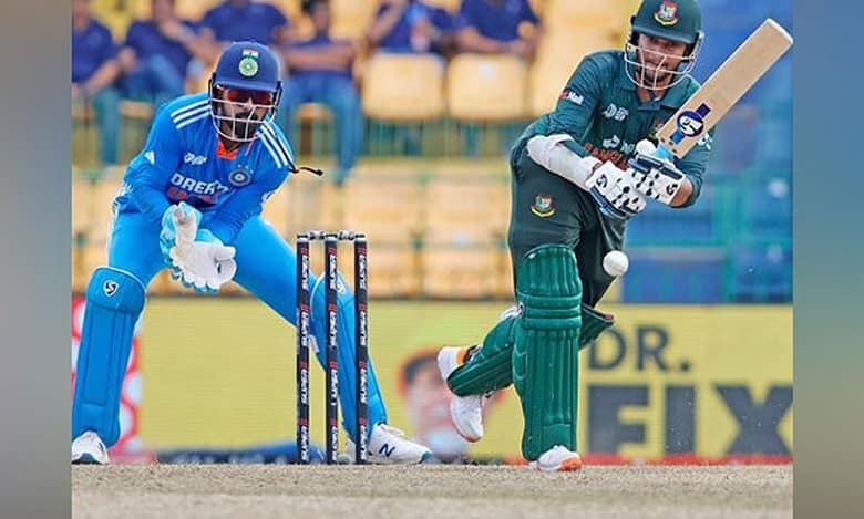 Fifties by Shakib and Towid lift Bangladesh to 265/8 against India