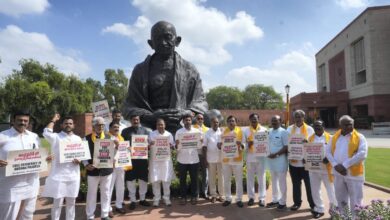 Telugu Desam Party (TDP) MPs with former Andhra Pradesh CM N Chandrababu Naidu’s son Nara Lokesh stage a protest at Mahatma Gandhi statue over Naidu's arrest