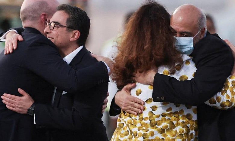 Five American prisoners freed from Iran return to US