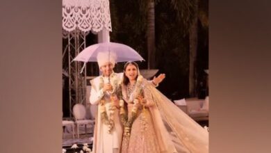 Parineeti, Raghav groove under umbrella as they walk down aisle