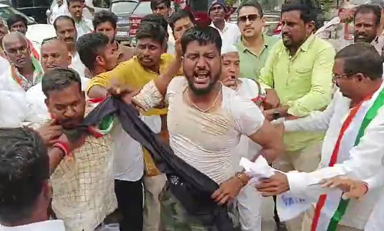 Telangana polls: Disgruntled Cong workers attempt self immolation at Gandhi Bhavan