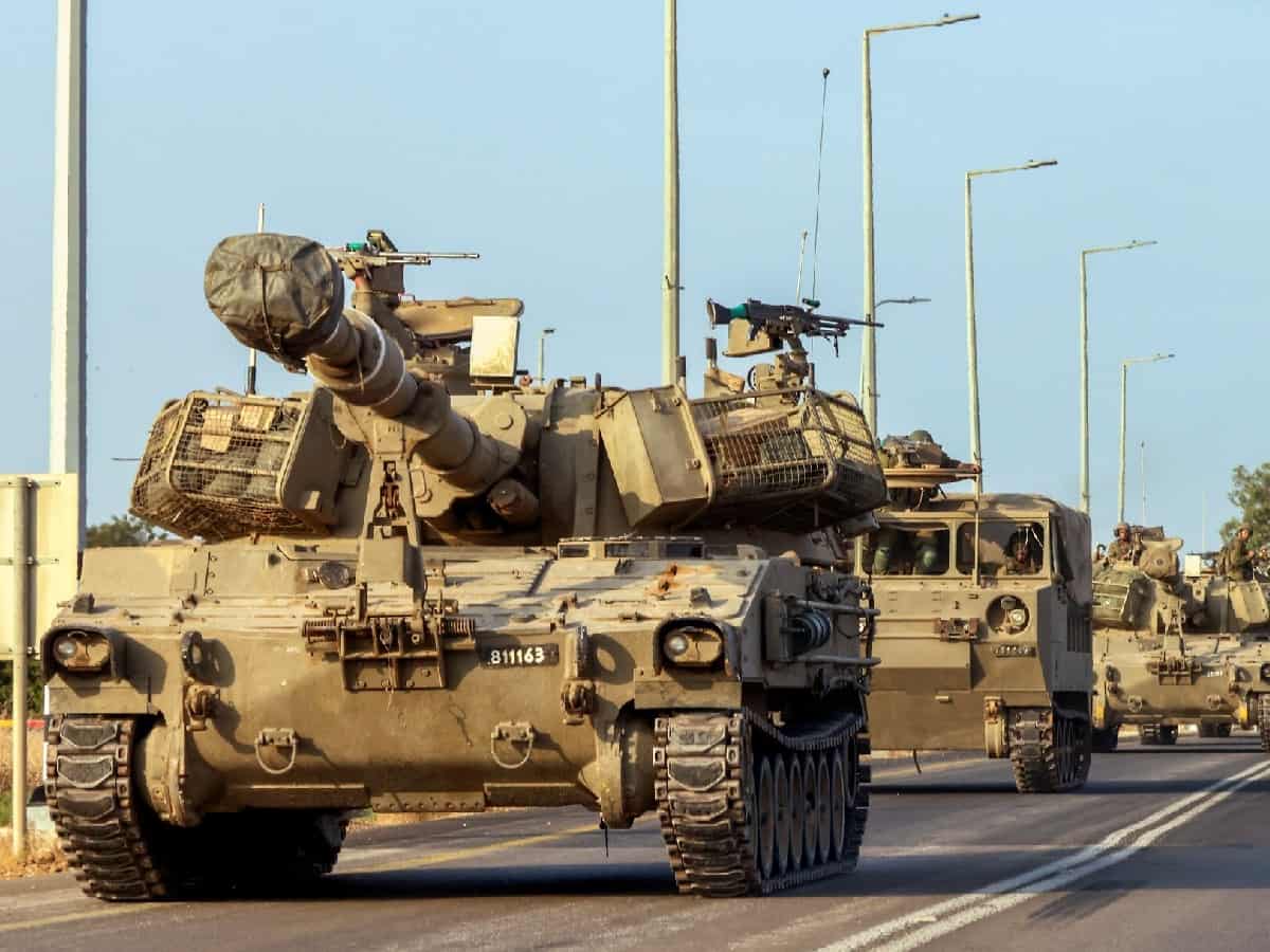 Israel moves hundreds of tanks close to Gaza fence as ground invasion looms